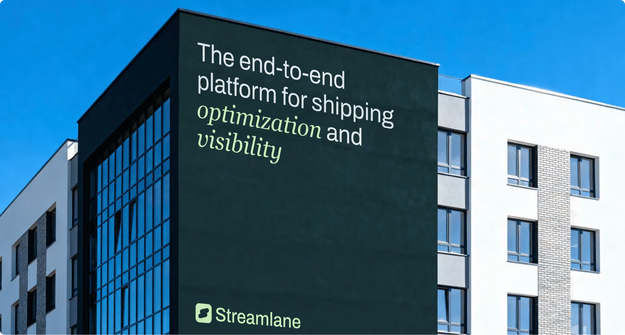 Streamlane brand on a building-side billboard